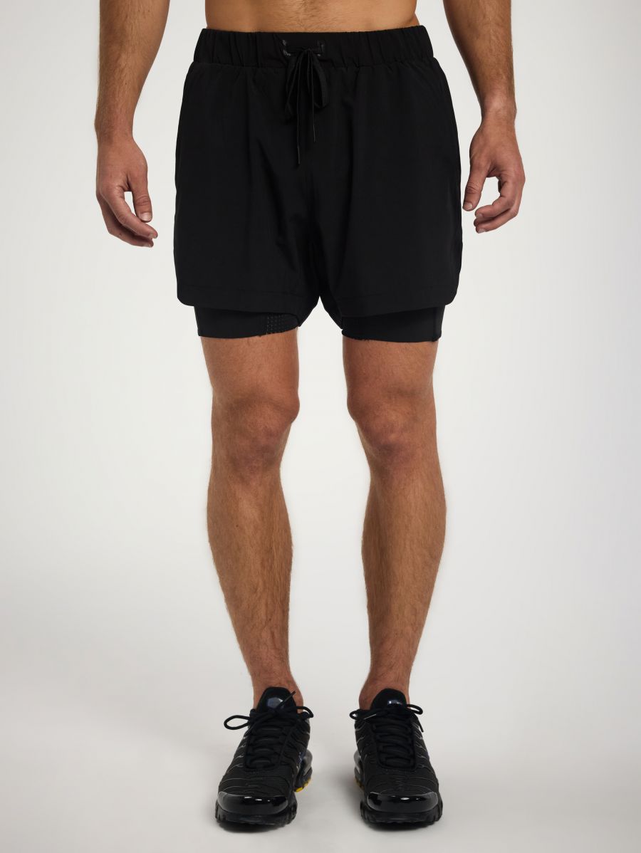 מכנסי אימון עם טייץ מובנה באורך ”5