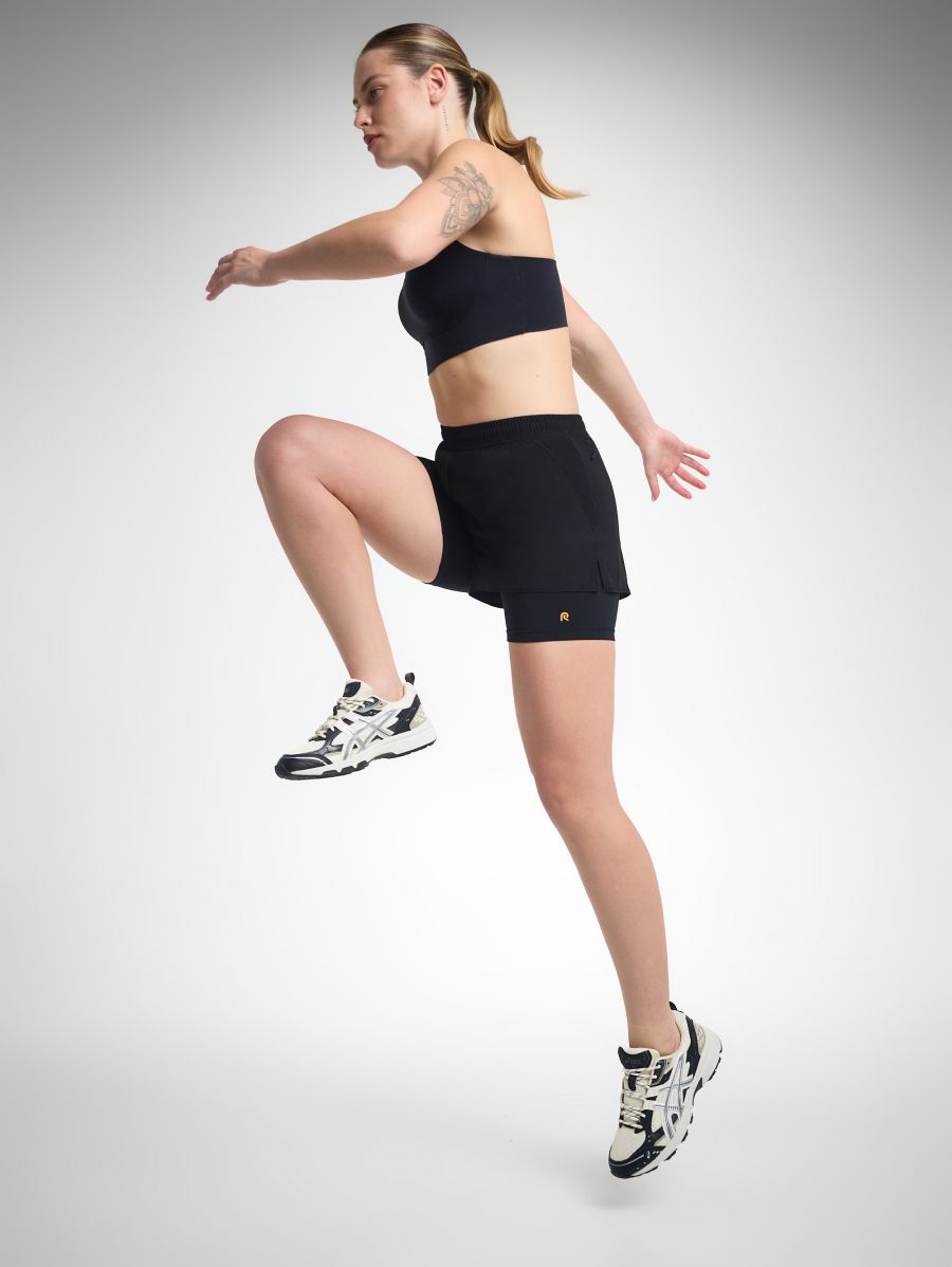 מכנסי ריצה עם טייץ פנימי