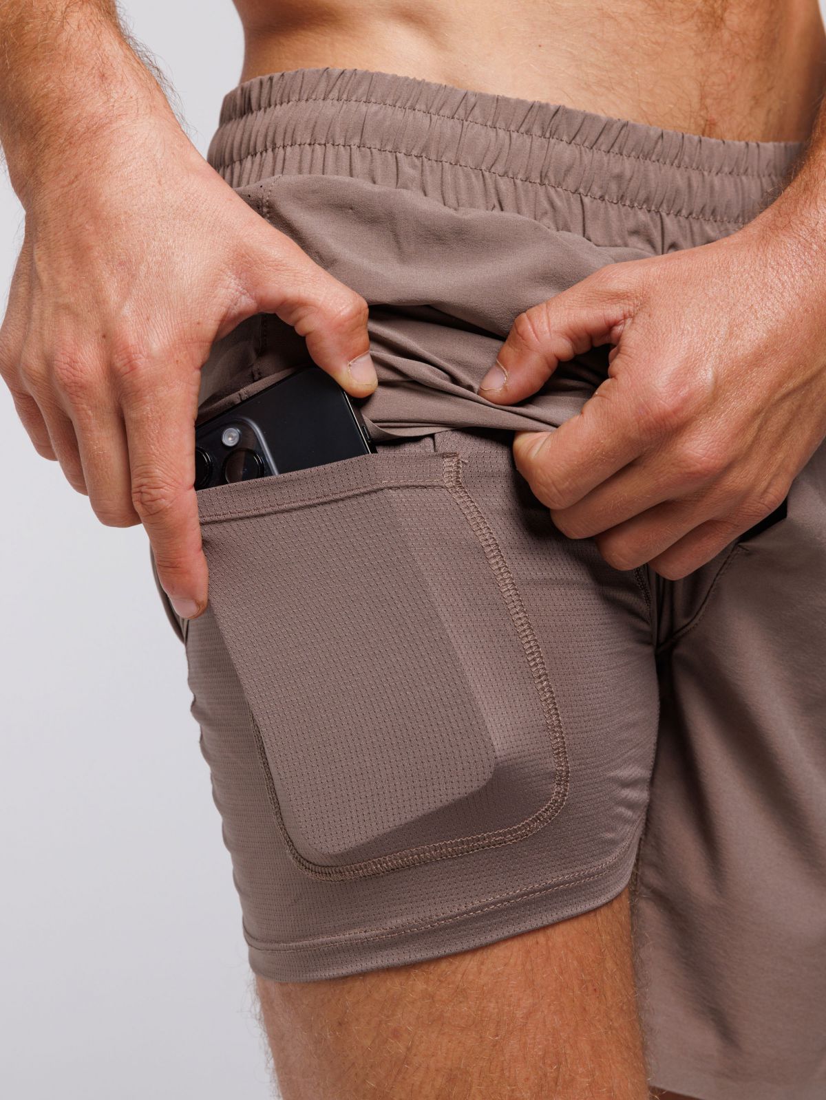 מכנסי יוגה עם טייץ מובנה אורך ”7